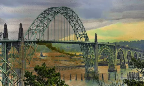 Waldport: The arched Waldport bridge over the bay under an amber sky
